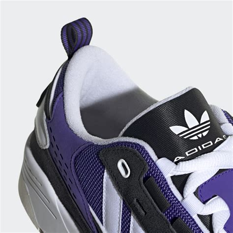 purple Adidas sneakers